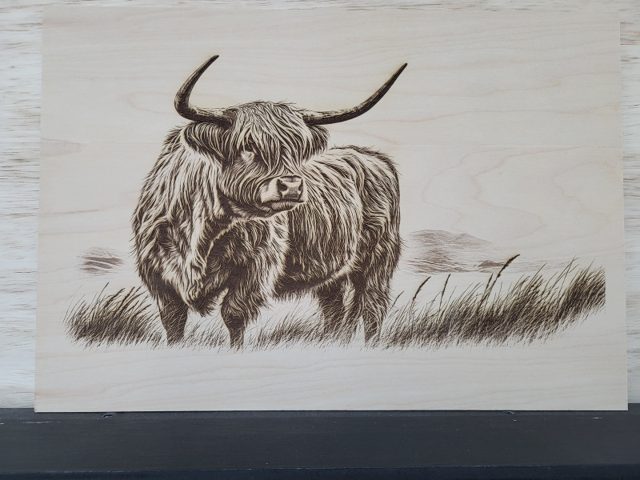 Highland Cow in the Field, handmade wood piece by Silverado Wood Craft